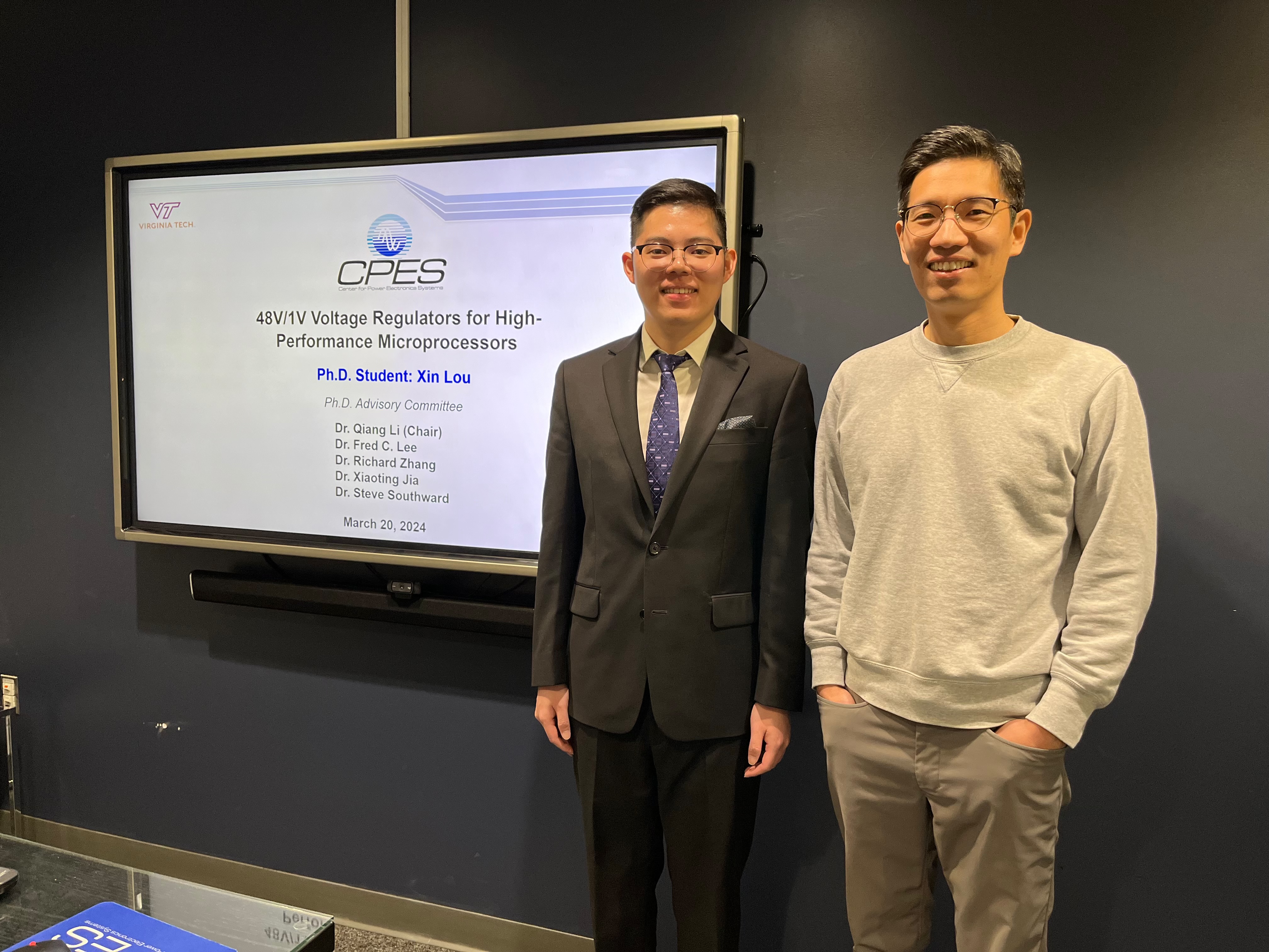 Photograph of Dr. Xin Lou and Dr. Qiang Li in front of Xin Lou